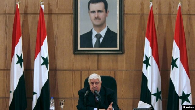 Syria's Foreign Minister Walid al-Moualem talks during a news conference in Damascus, Syria, Feb. 6, 2016. 