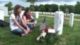 Soldiers Place US Flags in Arlington Cemetery for Memorial Day