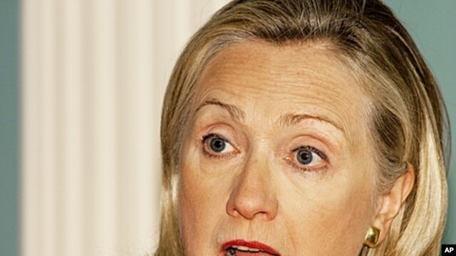 US Secretary of State Hillary Clinton responds to reporter's questions at the US Department of State, September  13, 2011.