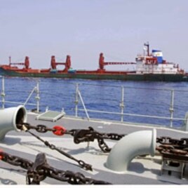 A view of the United Nations World Food Program (WFP) ship, MV Fidel (in the background) in the high seas of the Indian Ocean, off the Somalia coastline (2009 file photo)