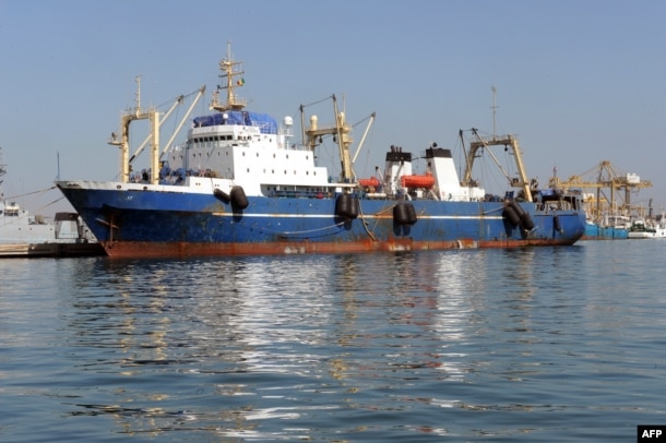 FILE - A Russian trawler "Oleg Naïdenov", is moored in Dakar on Jan. 5, 2014. The ship was boarded after it was observed illegally fishing in Senegalese waters near the border with Guinea Bissau.