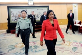 美国国家安全事务顾问苏珊•赖斯在北京八一大楼会见中国中央军委副主席范长龙（2014年9月9日）