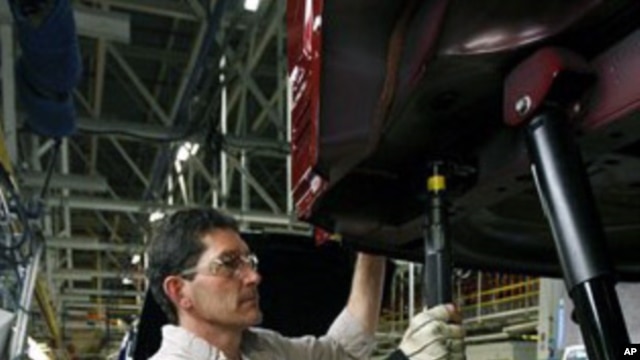 BIll Beaverson works on a Jeep at the Chrysler Toledo Assembly complex, in Toledo, Ohio. The U.S. unemployment rate fell last month to its lowest level in more than two years.