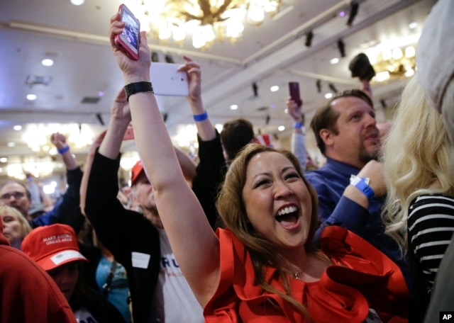 Supporters cheer during a caucus night rally for Republican presidential candidate Donald Trump, Feb. 23, 2016.
