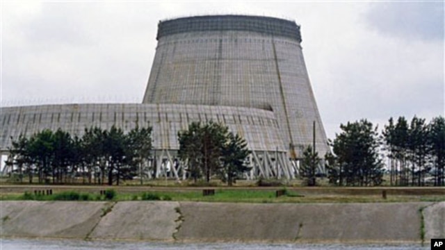 Reactor No. 4 of the Chernobyl nuclear power plant stands encased in lead and concrete following the Reactor No. 4 of the Chernobyl nuclear power plant stands encased in lead and concrete following the April 1986 accident, which released a cloud of radiat