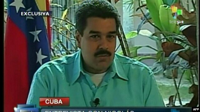 Television image shows Venezuelan Foreign Minister and Vice President Nicolas Maduro during an interview in Havana, Jan. 1, 2013.