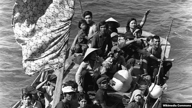 Vietnamese boat people rescued northeast of Cam Ranh Bay, Vietnam, after spending eight days at sea. 15 May 1984. (US Navy)