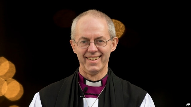 The new Archbishop of Canterbury, Justin Welby, walks outside St Paul's Cathedral as he poses for the media following his ceremony known as the confirmation of election in London, February 4, 2013.