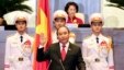 Nguyen Xuan Phuc, center, takes oath after being elected as prime minister in Hanoi, Vietnam Thursday April, 7, 2016.