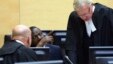 William Ruto (C) sits in the courtroom of the International Criminal Court in The Hague, May 14, 2013.