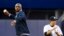 Patrick Vieira, left, head of the elite development squad at Manchester City Football Club, throws out the ceremonial first pitch near New York Yankees' Hiroki Kuroda, Yankee Stadium, New York, May 17, 2013.