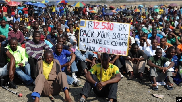 Striking Lonmin Platinum miners gather in Marikana, South Africa, where a new wage offer was rejected, Sept. 14, 2012. 