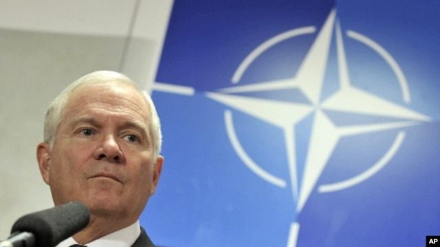 U.S. Defense Secretary Gates holds a news conference at a NATO defense ministers meeting at the Alliance headquarters in Brussels, March 10, 2011
