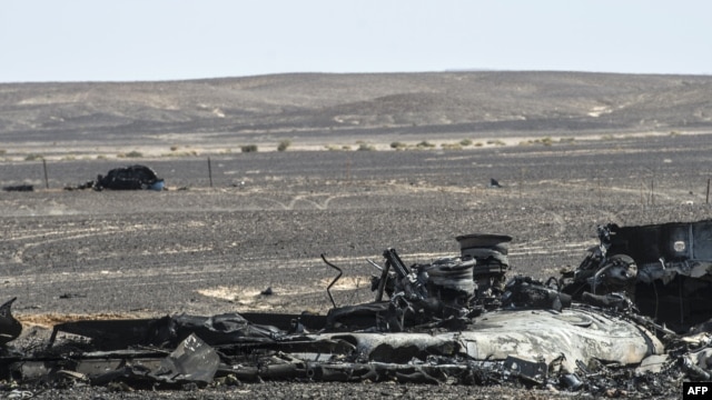 Debris of the A321 Russian airliner lie on the ground a day after the plane crashed in Wadi al-Zolomat, a mountainous area in Egypt's Sinai Peninsula, Nov. 1, 2015. 