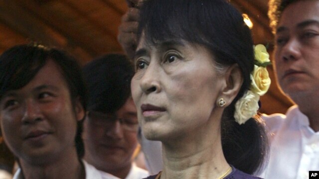 Burma's opposition leader Aung San Suu Kyi during the opening ceremony of a photo exhibition entitled "Aung San Suu Kyi, The Burmese Way to Democracy" at Institute of French in Rangoon, May 17, 2012. 