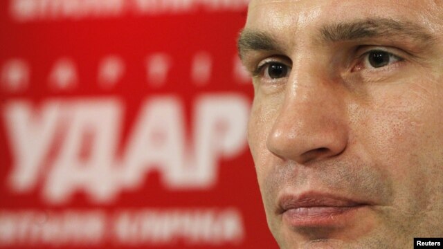 Heavyweight boxing champion and UDAR (Punch) party leader Vitaly Klitschko attends a news conference at his party's election headquarters in Kiev, October 29, 2012. 