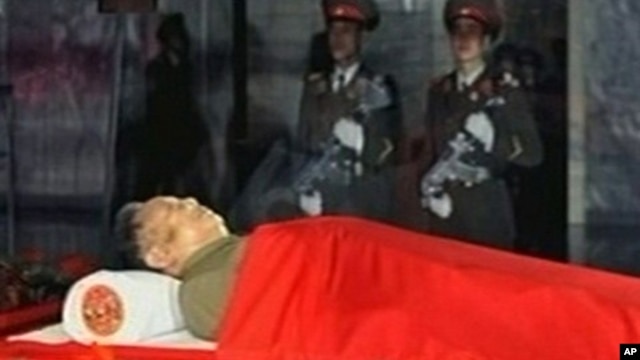 The body of North Korean leader Kim Jong Il is laid in a memorial palace in Pyongyang, North Korea, December 20, 2011.
