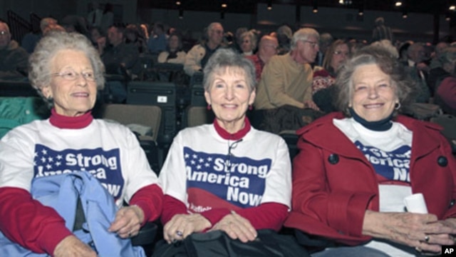 Katie McCann, and Bev Stogdill (L-R) from Johnston, Iowa, await the beginning of the Iowa Faith & Freedom Coalition's Spring Event at Point of Grace Church in Waukee, Iowa. Five possible Republican White House hopefuls courted conservative voters in Iowa,