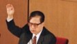 图为退居二线的乔石1997年9月18日在中共十五大上