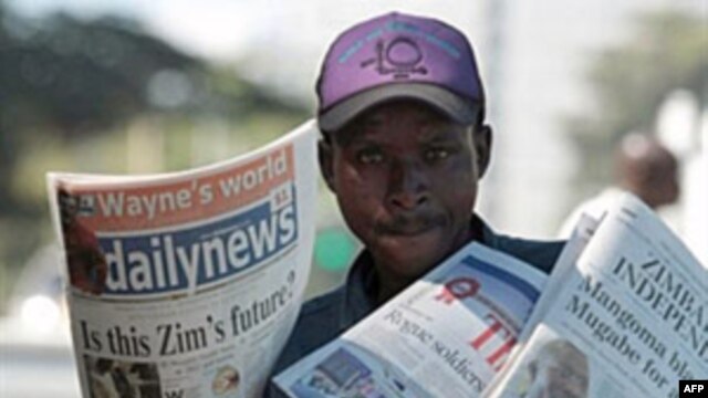 A vendor sells the privately-owned Daily News newspaper in Harare, March 18, 2011