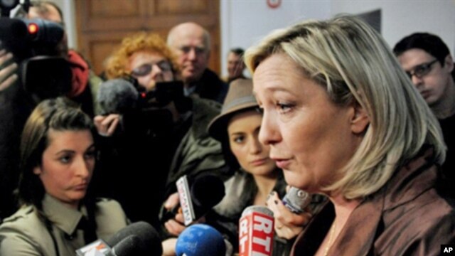 French presidential candidate, Marine Le Pen (R), president of the extreme right political party, leads the first round of public polls with 23 percent of the vote in Lille, northern France, March 5, 2011