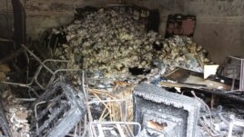 The fire at Shafiq headquarters in Cairo was confined to a garage out back. (Elizabeth Arrott/VOA)