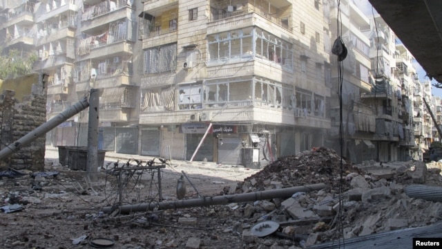 A street after clashes between Free Syrian Army fighters and forces loyal to Syria's President Bashar Al-Assad in Salah Edinne district in the center of Aleppo August 8, 2012. 