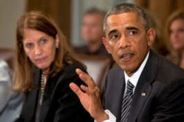 President Barack Obama, right, next to Health and Human Services Secretary Sylvia Burwell, speaks to the media about Ebola during a meeting in the Cabinet Room of the White House, Oct. 15, 2014.