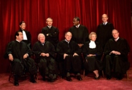 US Supreme Court justices pose for a group portrait in 1994. From left, front are: Antonin Scalia, John Paul Stevens, Chief Justice William Rehnquist, Sandra Day O'Connor and Anthony Kennedy. From left, back row are: Ruth Bader Ginsburg, David Souter, C