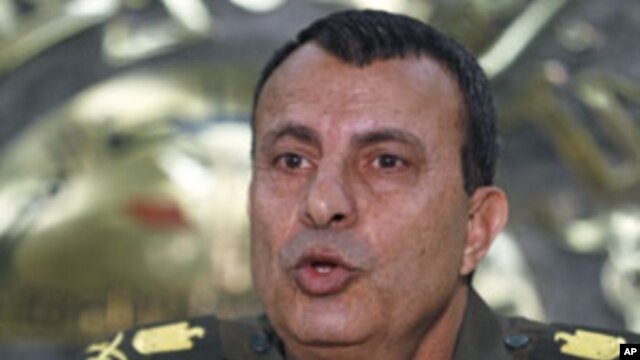 General Ismail Etman, director of moral affairs and a member of the Supreme Council of the Armed Forces, speaks during a news conference at the military media centre in Cairo, March 28, 2011