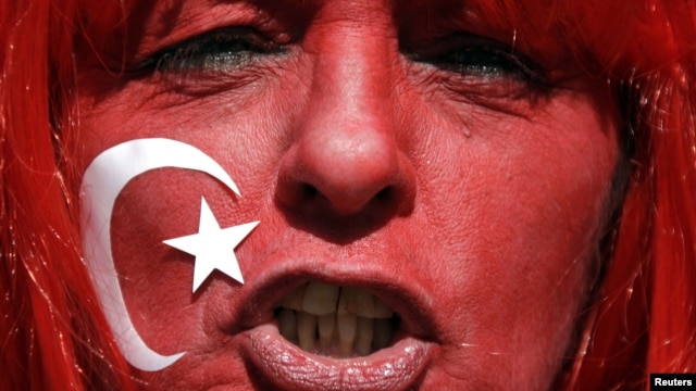 A member of 'PETA' (People for the Ethical Treatment of Animal) shouts slogans during a demonstration in front of  the Turkish embassy in Berlin, Germany, May 22, 2008, demanding an end to what PETA says is the inhumane and violent methods of culling stray dogs in Turkey. 