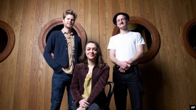 Members of the American folk rock band The Lumineers, from left, Wesley Schultz, Neyla Pekarek and Jeremiah Fraites at the Dream Downtown Hotel in New York, Jan 18, 2013.