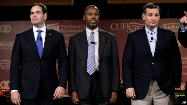 FILE - Republican presidential candidates (L-R) Senator Marco Rubio, retired neurosurgeon Ben Carson and Senator Ted Cruz stand on stage during the Presidential Family Forum, Nov. 20, 2015, in Des Moines, Iowa.