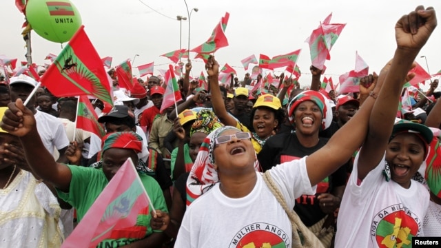 Supporters of Angola's main opposition UNITA party cheer during an election rally in Luanda, August 25, 2012. 