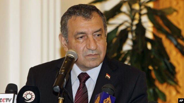 Egyptian Prime Minister Essam Sharaf attends a news conference in Doha, Qatar, April 27, 2011