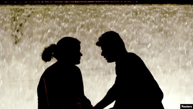 A couple in Athens' Syntagma Square