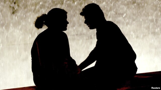 A couple in Athens' Syntagma Square