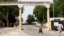 A woman crosses a deserted road in Bulumkutu, after the military declared a 24-hour curfew over large parts of Maiduguri in Borno State May 19, 2013.