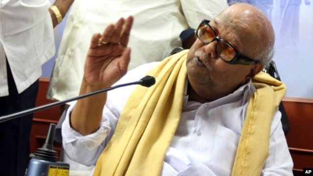 Leader of the Dravida Munnetra Kazhagam party M. Karunanidhi speaks at a press conference withdrawing support to India’s ruling United Progressive Alliance government, at the party office in Chennai, India, March 19, 2013.