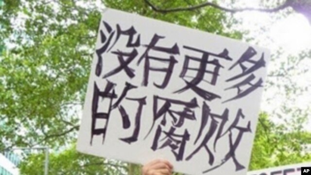 This “Occupy” protestor may have thought his sign said “No More Corruption.”  Actually, as translated, it’s closer to “There isn’t any more corruption.”