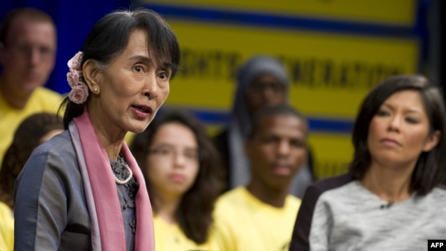 Burma's opposition leader Aung San Suu Kyi  speaks during a town hall meeting hosted by Amnesty International in Washington on September 20, 2012. 