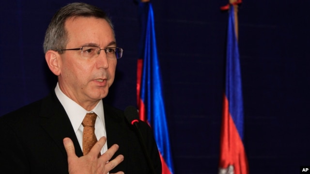 FILE - U.S. Principal Deputy Assistant Secretary of State for East Asian and Pacific Affairs Scot Marciel gestures during a press conference in Phnom Penh, Cambodia, Nov. 4, 2013. 