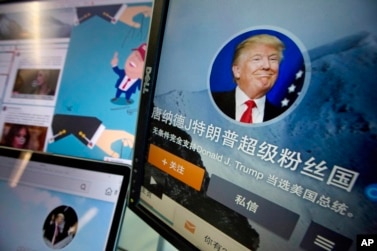 Chinese fan websites for Donald Trump are displayed on a computer with the words "Donald J. Trump super fan nation, Full and unconditional support for Donald J. Trump to be elected U.S. president" in Beijing, China, May 18, 2016. China features prominently in the rhetoric of presumed Republican presidential candidate Donald Trump, who accuses the country of stealing American jobs and cheating at global trade.