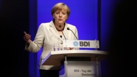 German Chancellor Angela Merkel gives a speech during the Federation of German Industries annual meeting in Berlin, September 25, 2012.