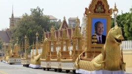The royal funeral convoys are prepared ahead of the funeral procession for Cambodia's late King Norodom Sihanouk Thursday, Jan. 31, 2013, in Phnom Penh, Cambodia. The body of Sihanouk who died on Oct. 15, 2012 at age 89 is scheduled to be cremated on Feb. 4, 2013. (AP Photo/Heng Sinith)
