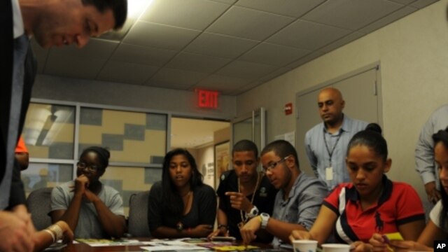 New York City students play Ne$t Egg at the city’s Department of Youth and Community Development.