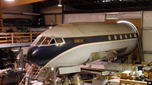 Only the front half of the de Havilland Comet - the first jet airliner in passenger service - fits into the restoration hanger.