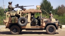 French special forces drive through the city of Gao, Northern Mali, Jan. 30, 2013. 