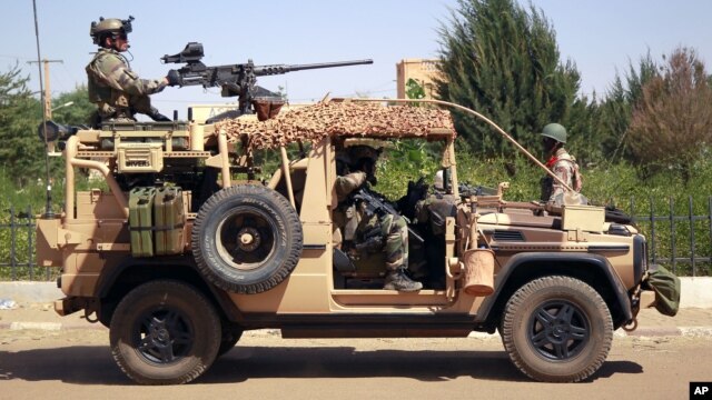 French special forces drive through the city of Gao, Northern Mali, Jan. 30, 2013. 