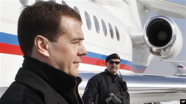 Russian President Dmitry Medvedev, left, February. 22, 2011